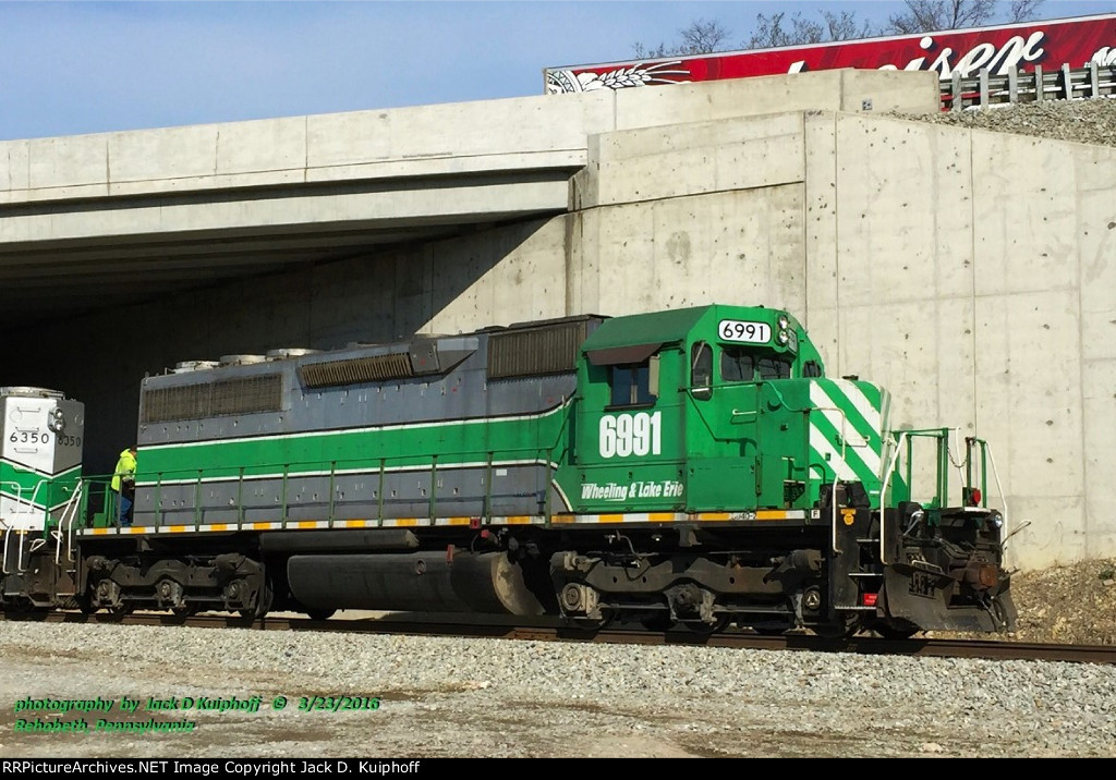 W&LE, Wheeling and Lake Erie Railroad, SD40-2"s 6991, sits under I-70 on the ex-P&WV at Rehoboth, Pennsylvania. March 23, 2016. 